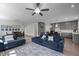 Spacious open-concept living area with modern ceiling fan flowing into the dining and kitchen areas at 192 Logbridge Rd, Chapel Hill, NC 27516