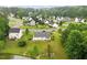 Neighborhood houses bordering a pond, creating a sense of community and natural beauty at 1969 Bowles Ave, Creedmoor, NC 27522