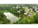 A pond surrounded by homes and forest offers a serene backdrop for this residential neighborhood at 1969 Bowles Ave, Creedmoor, NC 27522