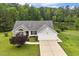 Aerial view of house with landscaped lawn and convenient driveway at 1969 Bowles Ave, Creedmoor, NC 27522