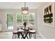 Bright dining area offering plenty of natural light and outdoor views at 1969 Bowles Ave, Creedmoor, NC 27522