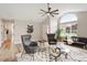 Elegant living room with vaulted ceiling, modern decor and lots of natural light at 1969 Bowles Ave, Creedmoor, NC 27522