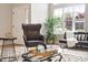 Cozy living room featuring lots of natural light, seating and neutral tones at 1969 Bowles Ave, Creedmoor, NC 27522