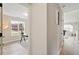 Hallway leading to a bright home office with a large window at 1969 Bowles Ave, Creedmoor, NC 27522