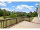 Patio view with trees and serene water backdrop from deck at 1969 Bowles Ave, Creedmoor, NC 27522