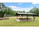 Neighborhood picnic area with tables and a shelter next to baseball field at 1969 Bowles Ave, Creedmoor, NC 27522