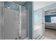 Well-lit bathroom featuring a walk-in shower and separate soaking tub at 2012 Sterling Hill Dr, Fuquay Varina, NC 27526
