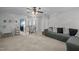 Upstairs bonus room featuring a ceiling fan, couch, and furniture at 2012 Sterling Hill Dr, Fuquay Varina, NC 27526