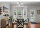 Cozy dining area features a round table, comfortable chairs, and natural light at 2012 Sterling Hill Dr, Fuquay Varina, NC 27526