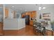 Open floor plan featuring a dining area with a wine rack and a view of the kitchen at 2012 Sterling Hill Dr, Fuquay Varina, NC 27526