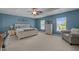 Spacious main bedroom offers natural light, a tray ceiling, and a ceiling fan at 2012 Sterling Hill Dr, Fuquay Varina, NC 27526