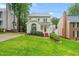 Charming two-story home features a well-manicured lawn, inviting front porch, and classic architectural details at 203 Lighthouse Way, Cary, NC 27511