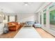 Spacious living room with hardwood floors, natural light and comfortable seating at 203 Lighthouse Way, Cary, NC 27511