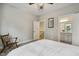Bedroom with view of ensuite bathroom and view of staircase at 205 Sherman Pines Dr, Fuquay Varina, NC 27526