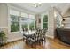 Eat-in kitchen and dining area with a view to the exterior at 205 Sherman Pines Dr, Fuquay Varina, NC 27526