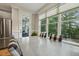 Dining area with a view to the backyard and screened porch at 205 Sherman Pines Dr, Fuquay Varina, NC 27526