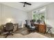Comfortable home office with desk, office chair and natural light from large window at 205 Sherman Pines Dr, Fuquay Varina, NC 27526