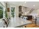 Dining area with a view into the living room and kitchen at 205 Sherman Pines Dr, Fuquay Varina, NC 27526