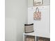 Bright mudroom featuring white storage bench, hooks, and neutral decor for an organized entryway at 21 Diploma Dr, Clayton, NC 27520