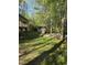 Large backyard with mature trees, shed and fire pit at 2122 Sterling Creek Ln, Franklinton, NC 27525