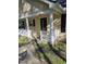 Charming covered front porch with white columns and railing at 2122 Sterling Creek Ln, Franklinton, NC 27525