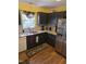 Well-equipped kitchen features stainless steel appliances and a large window at 2122 Sterling Creek Ln, Franklinton, NC 27525