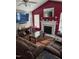 Cozy living room boasts a fireplace, vaulted ceilings, and natural light at 2122 Sterling Creek Ln, Franklinton, NC 27525