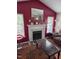 Bright living room with fireplace and neutral toned furniture at 2122 Sterling Creek Ln, Franklinton, NC 27525