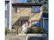 Two-story home featuring a wooden facade, a ramp leading to the front door, and mature landscaping at 2146 Charles St # 12, Durham, NC 27707