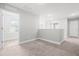 An empty bonus room featuring light colored carpet and lots of natural light at 222 Trailing Oak Trl, Clayton, NC 27527
