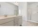 The main bathroom features double sinks, a shower, and a soaking tub at 222 Trailing Oak Trl, Clayton, NC 27527