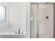 Soaking tub and shower in the main bathroom provides a spa-like experience at 222 Trailing Oak Trl, Clayton, NC 27527