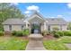 Charming clubhouse with well-manicured landscaping and brick accents, providing an inviting community space at 231 Grindstone Dr, Apex, NC 27502