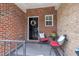 Inviting porch with seating and decor at 231 Grindstone Dr, Apex, NC 27502