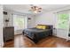 Relaxing bedroom with hardwood floors, great natural light, and gray accents at 2410 Overbrook Ln, Sanford, NC 27330