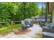 Deck with rocking chairs, seating, and great view of the yard at 2410 Overbrook Ln, Sanford, NC 27330