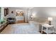 Cozy living room with a large, plush area rug and modern decor at 2410 Overbrook Ln, Sanford, NC 27330