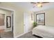 A serene bedroom with a closet in view, indoor plants, and bright, natural lighting at 2508 Albany St, Durham, NC 27705