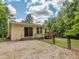 Image of the backyard featuring a wooden deck and fenced-in area, perfect for outdoor activities at 280 Sagamore Dr, Louisburg, NC 27549