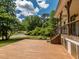Wood deck with stairs leading to landscaped backyard at 280 Sagamore Dr, Louisburg, NC 27549