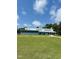 Community clubhouse with manicured lawn; the perfect location for community gatherings at 280 Sagamore Dr, Louisburg, NC 27549