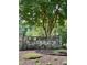 Stone community entrance sign for Lake Royale, surrounded by trees and landscaping at 280 Sagamore Dr, Louisburg, NC 27549