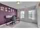 A home office is furnished with a desk, two monitors, and a chair at 3019 Britmass Dr, Raleigh, NC 27616