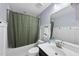 Cozy bathroom featuring a tub with shower, toilet, vanity with sink and a large mirror at 309 Old Mill Village Dr, Apex, NC 27502