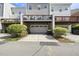 Exterior of a townhome with garage and deck at 309 Old Mill Village Dr, Apex, NC 27502