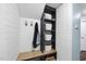 Functional mudroom with shiplap walls, bench seating, coat hooks and basket storage at 309 Old Mill Village Dr, Apex, NC 27502
