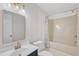 Bathroom features bright sink and vanity and tiled shower with tub at 309 Penn Oak Cir, Raleigh, NC 27615