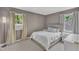 Cozy bedroom with neutral walls, carpet flooring, and natural light at 309 Penn Oak Cir, Raleigh, NC 27615
