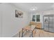 Cozy dining area with table and bench seating by the kitchen at 309 Penn Oak Cir, Raleigh, NC 27615