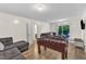 Basement game room featuring a foosball table and comfortable seating for entertainment at 309 Penn Oak Cir, Raleigh, NC 27615
